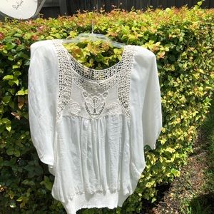 White flowy top with crochet detail